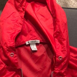 Red windbreaker